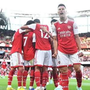 Arsenal's Bukayo Saka and Gabriel Martinelli Celebrate Goals Against Liverpool in 2022-23 Premier League
