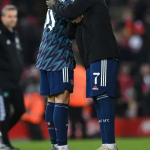 Arsenal's Bukayo Saka and Gabriel Martinelli Embrace in Carabao Cup Semi-Final Clash vs Liverpool