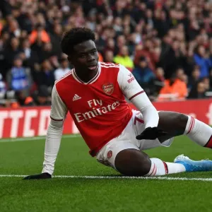 Arsenal's Bukayo Saka Goes Head-to-Head with Chelsea in Premier League Clash Arsenal's Bukayo Saka Goes Head-to-Head with Chelsea in Premier League Clash