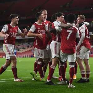 Arsenal's Bukayo Saka and Hector Bellerin Celebrate Goal During Arsenal v Chelsea Warm-Up (2020-21)