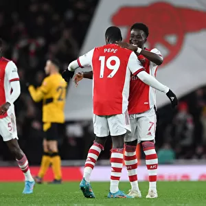 Arsenal's Bukayo Saka and Nicolas Pepe Celebrate Goal vs. Wolverhampton Wanderers (2021-22)