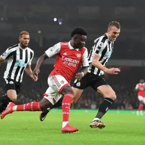Arsenal's Bukayo Saka Outsmarts Newcastle's Dan Burn: A Premier League Tactical Showdown