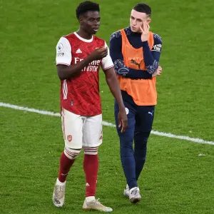 Arsenal's Bukayo Saka and Phil Foden Exchange Words After Arsenal v Manchester City, 2021-22 Premier League Arsenal's Bukayo Saka and Phil Foden Exchange Words After Arsenal v Manchester City, 2021-22 Premier League