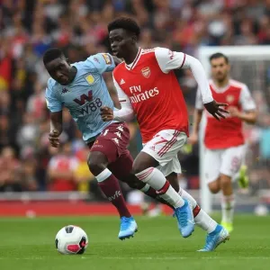 Arsenal's Bukayo Saka vs. Aston Villa's Marvelous Nakamba: A Premier League Battle at Emirates Stadium