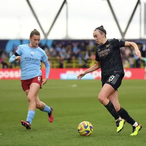 Arsenal's Caitlin Foord Fights Past Manchester City Defender in FA Women's Super League Clash Arsenal's Caitlin Foord Fights Past Manchester City Defender in FA Women's Super League Clash