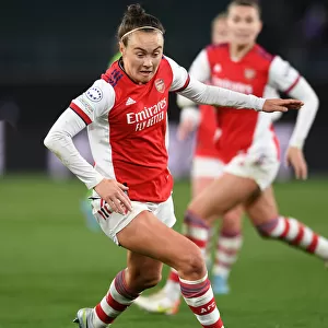 Arsenal's Caitlin Foord Fights for Victory in Champions League Quarterfinal Clash against VfL Wolfsburg