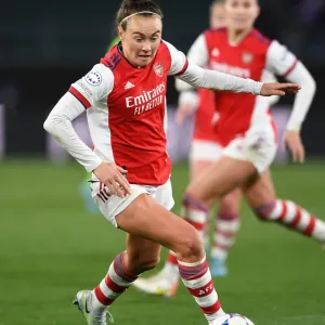 Arsenal's Caitlin Foord Fights for Victory in Champions League Quarterfinal Clash against VfL Wolfsburg
