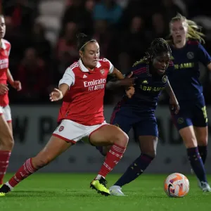 Arsenal's Caitlin Foord Fouls by Ajax's Liza van der Most in UEFA Women's Champions League Clash