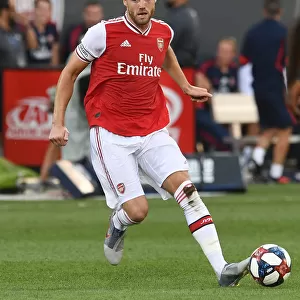 Arsenal's Calum Chambers in Action Against Colorado Rapids