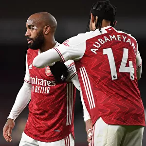 Arsenal's Captain Transfer: Aubameyang Passes Armband to Lacazette during Empty Emirates Stadium Showdown (Arsenal v Liverpool, 2021)