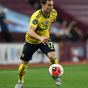 Arsenal's Cedric Faces Off in Intense Premier League Showdown Against Aston Villa