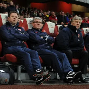 Arsenal's Coach Trio: Wenger, Rice, and Lewin during the 2011-2012 Arsenal vs. Wolverhampton Wanderers Match