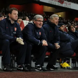 Arsenal's Coach Trio: Wenger, Rice, and Lewin (2011-2012) - Arsene Wenger, Pat Rice, and Colin Lewin during Arsenal vs. Wolverhampton Wanderers