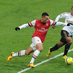 Arsenal's Coquelin Clashes with Swansea's Richards in FA Cup Third Round Replay