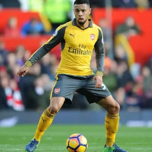 Arsenal's Coquelin Faces Off Against Manchester United at Old Trafford (2016-17 Premier League) Arsenal's Coquelin Faces Off Against Manchester United at Old Trafford (2016-17 Premier League)