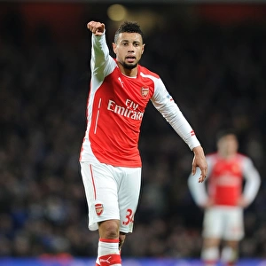 Arsenal's Coquelin Fights for Possession Against Leicester City in 2015 Premier League Clash