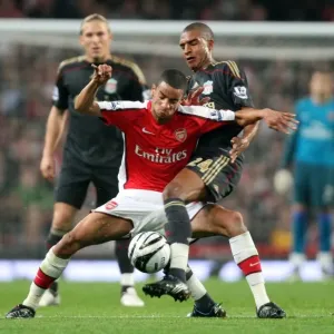 Arsenal's Craig Eastmond vs. Liverpool's David Ngog: A Clash in the Carling Cup, Arsenal 2:1