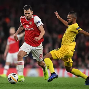 Arsenal's Dani Ceballos Outmaneuvers Standard Liege's Mehdi Carcela in Europa League Clash