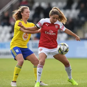 Arsenal's Danielle van de Donk Shields the Ball from Birmingham's Kerys Harrop in WSL Clash Arsenal's Danielle van de Donk Shields the Ball from Birmingham's Kerys Harrop in WSL Clash