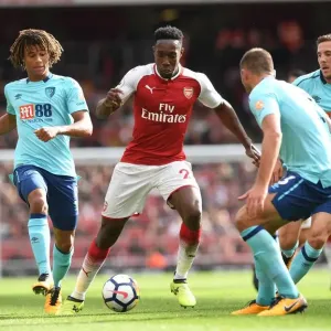 Arsenal's Danny Welbeck Clashes with AFC Bournemouth's Nathan Ake and Dan Gosling during the 2017-18 Premier League Match