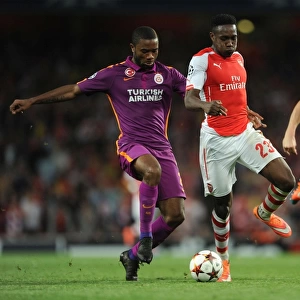 Arsenal's Danny Welbeck Clashes with Galatasaray's Aurelien Chedjou and Semih Kaya in Champions League Showdown