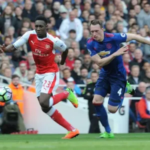 Arsenal's Danny Welbeck Clashes with Manchester United's Phil Jones in Premier League Showdown Arsenal's Danny Welbeck Clashes with Manchester United's Phil Jones in Premier League Showdown