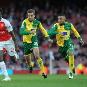 Arsenal's Danny Welbeck Clashes with Norwich's Gary O'Neil and Nathan Redmond during the 2015-16 Premier League Match Arsenal's Danny Welbeck Clashes with Norwich's Gary O'Neil and Nathan Redmond during the 2015-16 Premier League Match