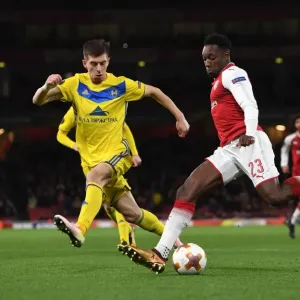 Arsenal's Danny Welbeck Faces Off Against BATE Borisov's Aleksei Rios