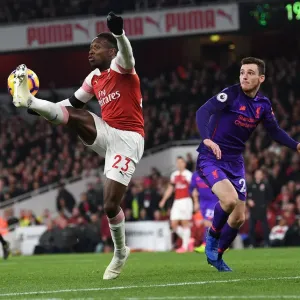 Arsenal's Danny Welbeck Faces Off Against Liverpool's Andrew Robertson in Premier League Showdown Arsenal's Danny Welbeck Faces Off Against Liverpool's Andrew Robertson in Premier League Showdown