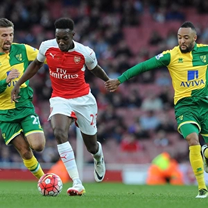 Arsenal's Danny Welbeck Faces Off Against Norwich's Gary O'Neil and Nathan Redmond during the 2015-16 Premier League Match