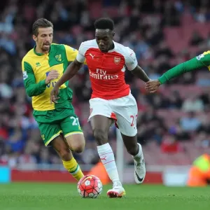 Arsenal's Danny Welbeck Faces Off Against Norwich's Gary O'Neil and Nathan Redmond during the 2015-16 Premier League Match Arsenal's Danny Welbeck Faces Off Against Norwich's Gary O'Neil and Nathan Redmond during the 2015-16 Premier League Match