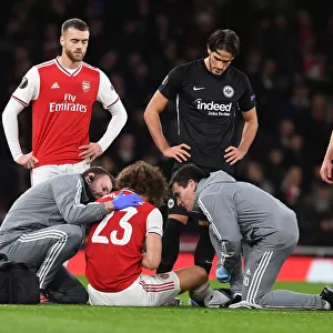 Arsenal's David Luiz Receives Medical Attention During Arsenal FC vs Eintracht Frankfurt UEFA Europa League Match