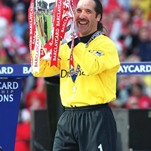 Arsenal's David Seaman Celebrates FA Premiership Title Win with the Trophy (Arsenal 4-3 Everton, 11/5/2002)