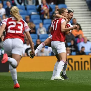 Arsenal's Deadly Duo: Miedema and van de Donk in Action, Scoring Glory for the Gunners