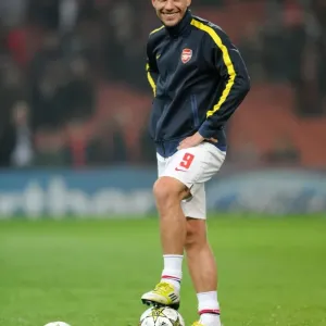 Arsenal's Deadly Dynamo: Lukas Podolski Gears Up for FC Schalke 04 Showdown in 2012-13 Champions League Arsenal's Deadly Dynamo: Lukas Podolski Gears Up for FC Schalke 04 Showdown in 2012-13 Champions League