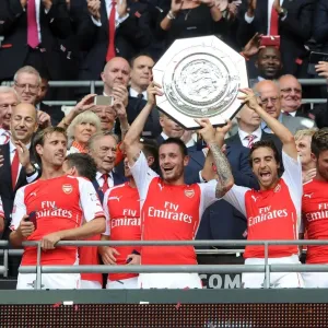Arsenal's Debuchy and Flamini Celebrate FA Community Shield Victory (2014/15) Arsenal's Debuchy and Flamini Celebrate FA Community Shield Victory (2014/15)