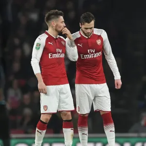 Arsenal's Debuchy Guides Chambers During Carabao Cup Clash vs. West Ham Arsenal's Debuchy Guides Chambers During Carabao Cup Clash vs. West Ham