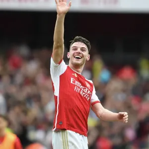 Arsenal's Declan Rice Celebrates with Fans after Victory over Nottingham Forest (2023-24) Arsenal's Declan Rice Celebrates with Fans after Victory over Nottingham Forest (2023-24)