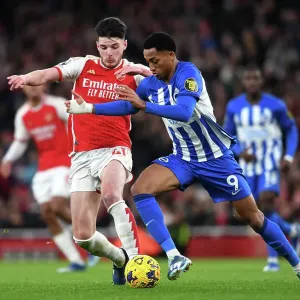 Arsenal's Declan Rice Tackles Joao Pedro in Premier League Clash Against Brighton & Hove Albion (2023-24)