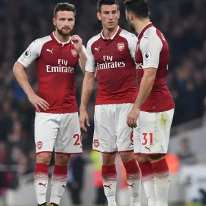 Arsenal's Defensive Trio: Mustafi, Koscielny, and Kolasinac in Action (Arsenal v West Bromwich Albion 2017-18) Arsenal's Defensive Trio: Mustafi, Koscielny, and Kolasinac in Action (Arsenal v West Bromwich Albion 2017-18)