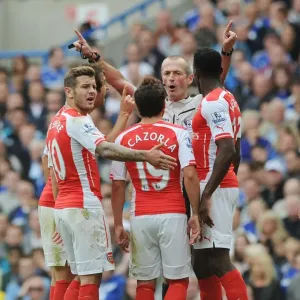 Arsenal's Dispute with Referee: Wilshere, Cazorla, and Welbeck at Chelsea's Stamford Bridge (2014-15)