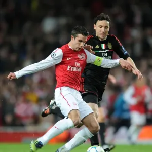 Arsenal's Dominant Performance: RvP Scores Twice as Arsenal Crushes AC Milan 3-0 in UEFA Champions League Arsenal's Dominant Performance: RvP Scores Twice as Arsenal Crushes AC Milan 3-0 in UEFA Champions League