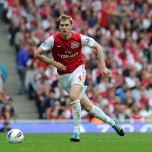 Arsenal's Dominant Victory: Per Mertesacker Scores in 3-0 Win over Bolton Wanderers (Premier League, 2011) Arsenal's Dominant Victory: Per Mertesacker Scores in 3-0 Win over Bolton Wanderers (Premier League, 2011)