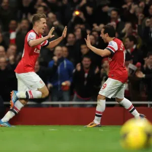 Arsenal's Double Act: Ramsey and Cazorla Celebrate Goals Against Liverpool (2013-14) Arsenal's Double Act: Ramsey and Cazorla Celebrate Goals Against Liverpool (2013-14)
