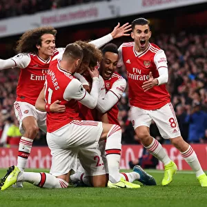 Arsenal's Double Delight: David Luiz and Teammates Celebrate Goals Against Crystal Palace (2019-20)