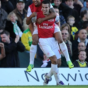 Arsenal's Double Strike: Van Persie and Walcott Celebrate Goals Against Norwich City, 2011-12