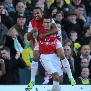 Arsenal's Double Strike: Van Persie and Walcott Celebrate Goals Against Norwich City, 2011-12