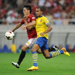 Arsenal's East Asian Showdown: Theo Walcott vs. Kunimitsu Sekiguchi Arsenal's East Asian Showdown: Theo Walcott vs. Kunimitsu Sekiguchi