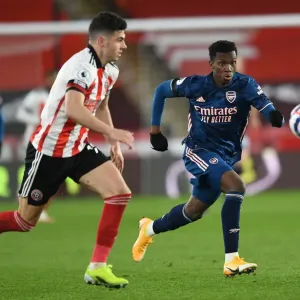 Arsenal's Eddie Nketiah in Action: Premier League Clash against Sheffield United (2020-21) Arsenal's Eddie Nketiah in Action: Premier League Clash against Sheffield United (2020-21)