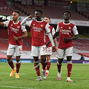 Arsenal's Eddie Nketiah, Aubameyang, and Saka Celebrate Goals Against West Ham United (2020-21)